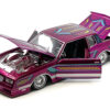 1986 Chevrolet Monte Carlo SS Lowrider Pink Metallic with Graphics “Lowriders” Series 1/24 Diecast Model Car by Maisto