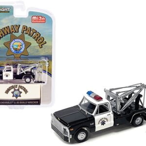 1969 Chevrolet C-30 Dually Wrecker Tow Truck Black and White CHP “California Highway Patrol” with Officer Figurine 1/64 Diecast Model Car by Greenlight