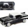 1957 Chevrolet Bel Air Black with White Top 1/24 Diecast Model Car by Motormax