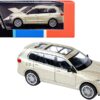 BMW X7 with Sunroof Sunstone Gold Metallic 1/64 Diecast Model Car by Paragon