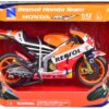 Honda RC213V Motorcycle #93 Marc Marquez “Repsol Honda Team” MotoGP (2015) 1/12 Diecast Model by New Ray