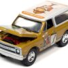 1970 Chevrolet Blazer Mustard Yellow with White Top (Colonel Mustard) w/Poker Chip Collector’s Token “Vintage Clue” “Pop Culture” 2022 Release 2 1/64 Diecast Model Car by Johnny Lightning